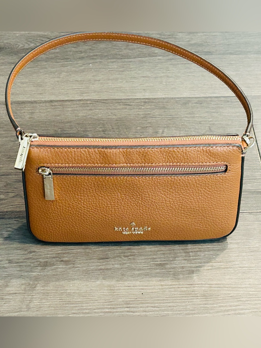 KATE SPADE Pebbled Leather Wristlet/Clutch Bag with Gold Hardware.